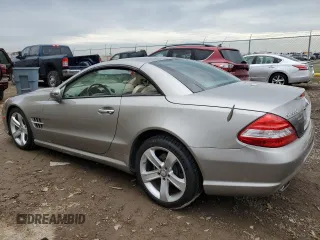 2009 Mercedes-Benz SL 550 with VIN WDBSK71F49F143492, listed as a Copart auction lot 88757425 with 89,117 mi miles and Salvage title. Bid and sale history available at DreamBid. Image 2.
