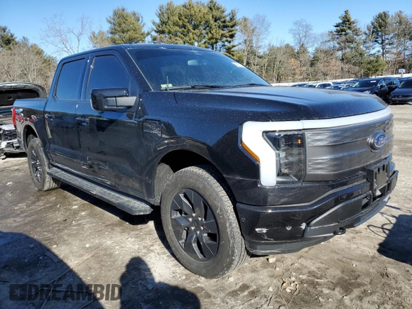 2023 Ford F-150 Lightning Pro with VIN 1FTVW1EL8PWG53681, listed as a Copart auction lot 42681505 with 7,570 mi miles and Salvage Title. Bid and sale history available at DreamBid. Image 4.