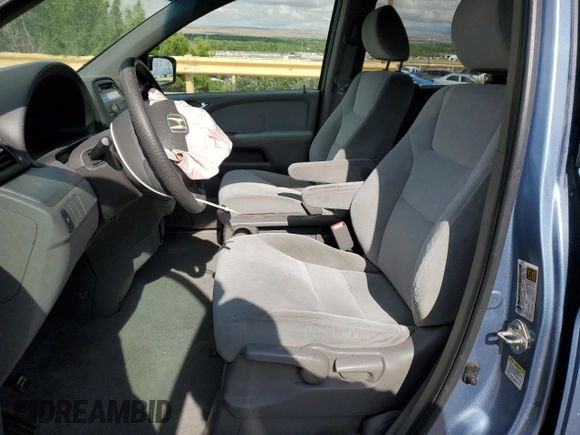 2010 Honda Odyssey LX with VIN 5FNRL3H23AB054658, listed as a Copart auction lot 62322195 with 160,550 mi miles and Salvage title. Bid and sale history available at DreamBid. Image 7.