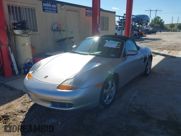 2002 Porsche Boxster z VIN WP0CA29882U622162, wystawiony jako IAAI lot #41654257 z przebiegiem 44 608 mil mil oraz . Historia ofert i sprzedaży dostępna na DreamBid. Obrazek 6.