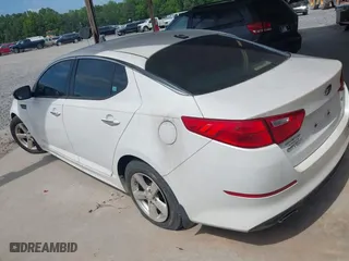 2015 Kia Optima LX with VIN KNAGM4A78F5607679, listed as a IAAI auction lot 42095899 with 125,164 mi miles. Bid and sale history available at carsss.com. Image 3.