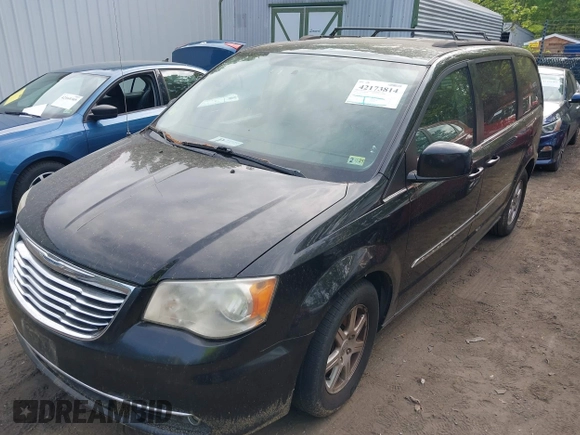 2012 Chrysler Town & Country Touring with VIN 2C4RC1BG7CR301101, listed as a IAAI auction lot 42173814 with 141,128 mi miles. Bid and sale history available at carsss.com. Image 2.