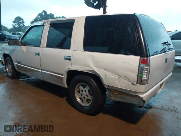 1995 Chevrolet Tahoe with VIN 1GNEC13K3SJ392069, listed as a IAAI auction lot 42192301 with 182,262 mi miles and . Bid and sale history available at DreamBid. Image 3.