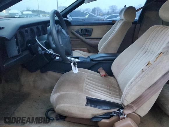 1990 Pontiac Firebird with VIN 1G2FS23TXLL205077, listed as a Copart auction lot 44035705 with 142,809 mi miles and Salvage title. Bid and sale history available at DreamBid. Image 7.