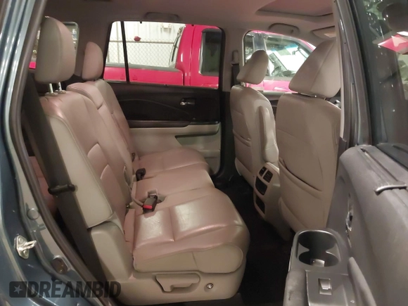 2019 Honda Pilot EX-L with VIN 5FNYF6H5XKB094879, listed as a IAAI auction lot 41265415 with 58,700 mi miles and . Bid and sale history available at DreamBid. Image 8.