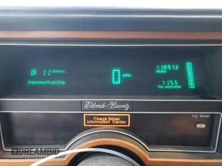 1988 Cadillac Eldorado z VIN 1G6EL1155JU600524, wystawiony jako Copart lot #59505125 z przebiegiem 110 972 mil mil oraz Szkoda całkowita • Salvage title. Historia ofert i sprzedaży dostępna na DreamBid. Obrazek 9.