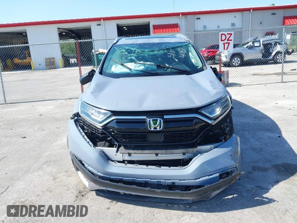 2022 Honda CR-V Touring z VIN 5J6RT6H91NL014087, wystawiony jako IAAI lot #42274863 z przebiegiem 53 478 mil mil oraz . Historia ofert i sprzedaży dostępna na DreamBid. Obrazek 6.