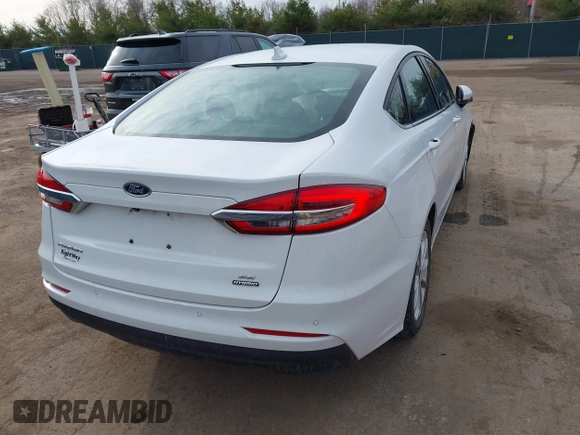 2020 Ford Fusion Hybrid SE with VIN 3FA6P0LU5LR195611, listed as a IAAI auction lot 41807998 with 128,439 mi miles. Bid and sale history available at carsss.com. Image 4.