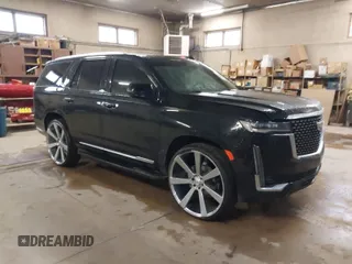 2021 Cadillac Escalade Luxury z VIN 1GYS4AKL7MR295510, wystawiony jako IAAI lot #38398966 z przebiegiem 26 228 mil mil oraz . Historia ofert i sprzedaży dostępna na DreamBid. Obrazek 1.
