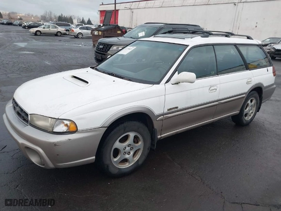 1999 Subaru Legacy Wagon Outback with VIN 4S3BG6852X7659898, listed as a IAAI auction lot 41298823 with 138,834 mi miles. Bid and sale history available at carsss.com. Image 2.