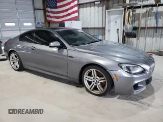 2015 BMW 6 Series 650i xDrive z VIN WBAYM1C53FD325311, wystawiony jako Copart lot #59563355 z przebiegiem 157 675 mil mil oraz Czysty tytuł • Clean title. Historia ofert i sprzedaży dostępna na DreamBid. Obrazek 4.