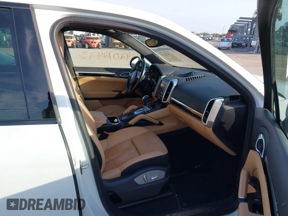 2014 Porsche Cayenne with VIN WP1AA2A23ELA97180, listed as a IAAI auction lot 42072423 with 143,374 mi miles and . Bid and sale history available at DreamBid. Image 5.