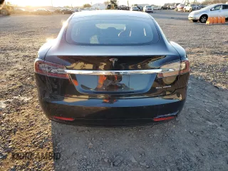 2019 Tesla Model S 75D with VIN 5YJSA1E23KF330239, listed as a Copart auction lot 86737544 with Not provided miles and Salvage title. Bid and sale history available at DreamBid. Image 6.
