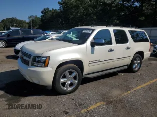 2013 Chevrolet Suburban LTZ with VIN 1GNSCKE03DR104530, listed as a Copart auction lot 74923234 with 230,803 mi miles and Clean Title. Bid and sale history available at carsss.com. Image 1.