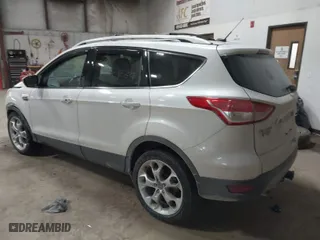 2016 Ford Escape Titanium with VIN 1FMCU9J9XGUC35958, listed as a IAAI auction lot 41389177 with 148,655 mi miles. Bid and sale history available at carsss.com. Image 3.