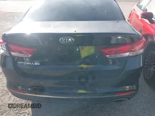 2016 Kia Optima LX with VIN 5XXGT4L31GG022844, listed as a IAAI auction lot 41240100 with 121,586 mi miles and . Bid and sale history available at DreamBid. Image 16.