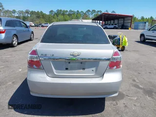 2007 Chevrolet Aveo LS with VIN KL1TD56617B098732, listed as a IAAI auction lot 41889243 with 115,426 mi miles and . Bid and sale history available at DreamBid. Image 16.