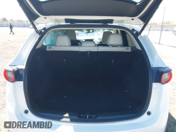 2018 Mazda CX-5 Grand Touring with VIN JM3KFBDM0J0404635, listed as a IAAI auction lot 41883068 with 71,178 mi miles. Bid and sale history available at carsss.com. Image 8.
