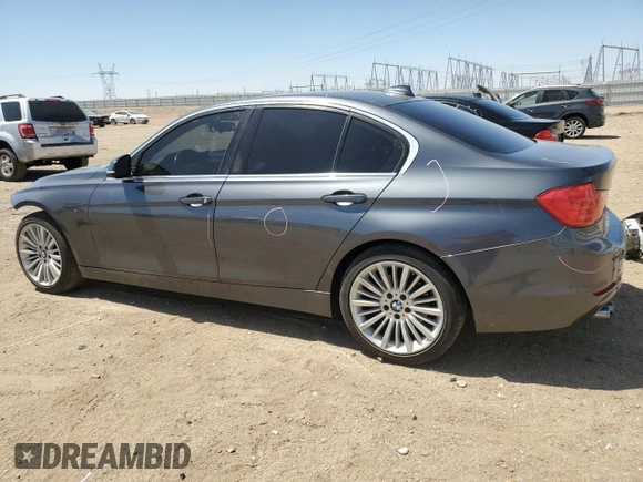 2013 BMW 3 Series 328i with VIN WBA3C1C56DF437440, listed as a Copart auction lot 61389475 with 122,736 mi miles and Salvage title. Bid and sale history available at DreamBid. Image 2.