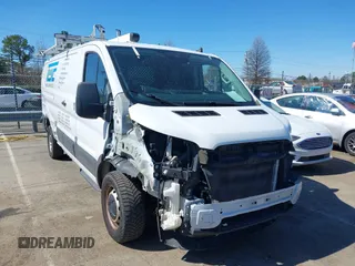 2020 Ford Transit Cargo z VIN 1FTBR1Y84LKB79621, wystawiony jako IAAI lot #41802213 z przebiegiem 89 167 mil mil oraz . Historia ofert i sprzedaży dostępna na DreamBid. Obrazek 1.