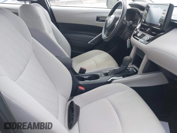 2022 Toyota Corolla Cross L with VIN 7MUAAAAG5NV013226, listed as a IAAI auction lot 42491707 with 34,514 mi miles and . Bid and sale history available at DreamBid. Image 5.