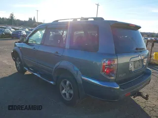 2007 Honda Pilot EX-L with VIN 2HKYF18697H540993, listed as a IAAI auction lot 41243560 with 320,290 mi miles and . Bid and sale history available at DreamBid. Image 3.
