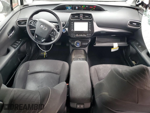 2021 Toyota Prius LE z VIN JTDKAMFP9M3196770, wystawiony jako Copart lot #54309555 z przebiegiem 21 948 mil mil oraz Szkoda całkowita • Salvage title. Historia ofert i sprzedaży dostępna na DreamBid. Obrazek 8.