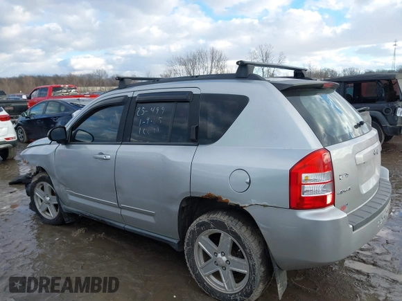 2010 Jeep Compass Sport with VIN 1J4NF4FB3AD589361, listed as a IAAI auction lot 41449412 with 127,807 mi miles. Bid and sale history available at carsss.com. Image 13.