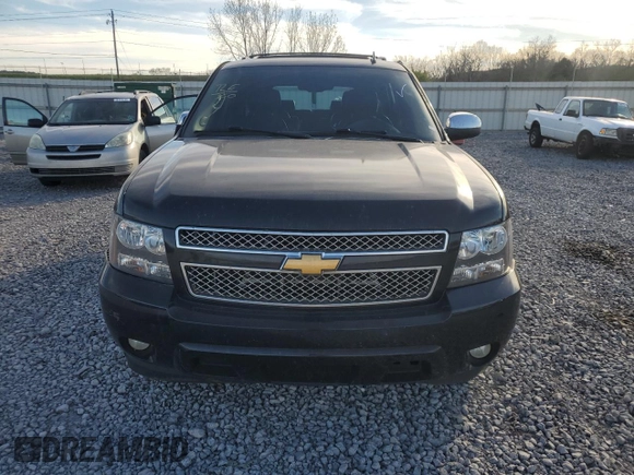 2013 Chevrolet Tahoe LTZ with VIN 1GNSCCE04DR162474, listed as a Copart auction lot 49386335 with 331,358 mi miles and Salvage title. Bid and sale history available at DreamBid. Image 5.