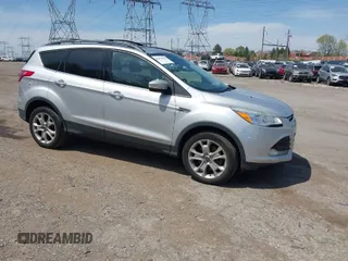 2013 Ford Escape SEL with VIN 1FMCU9HX5DUC09591, listed as a IAAI auction lot 42074088 with 131,554 mi miles. Bid and sale history available at carsss.com. Image 1.