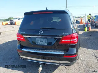 2018 Mercedes-Benz GLS 450 with VIN 4JGDF6EE1JB075332, listed as a IAAI auction lot 42120007 with 111,559 mi miles and . Bid and sale history available at DreamBid. Image 16.