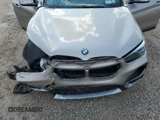 2021 BMW X1 xDrive28i with VIN WBXJG9C09M5S52289, listed as a Copart auction lot 64413105 with Not provided miles and Salvage title. Bid and sale history available at DreamBid. Image 11.