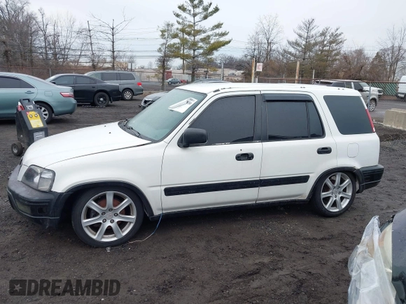 2000 Honda CR-V LX with VIN JHLRD2844YC010848, listed as a IAAI auction lot 41678830 with 173,137 mi miles. Bid and sale history available at carsss.com. Image 14.