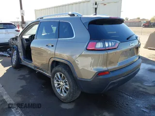 2020 Jeep Cherokee Latitude Plus with VIN 1C4PJLLB5LD521965, listed as a IAAI auction lot 41232028 with 77,729 mi miles. Bid and sale history available at carsss.com. Image 3.