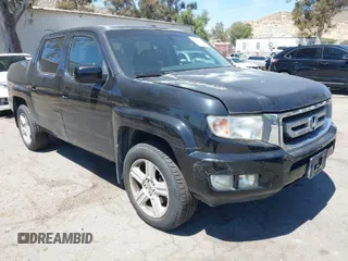 2011 Honda Ridgeline RTL with VIN 5FPYK1F50BB001442, listed as a IAAI auction lot 42023615 with 189,170 mi miles. Bid and sale history available at carsss.com. Image 1.