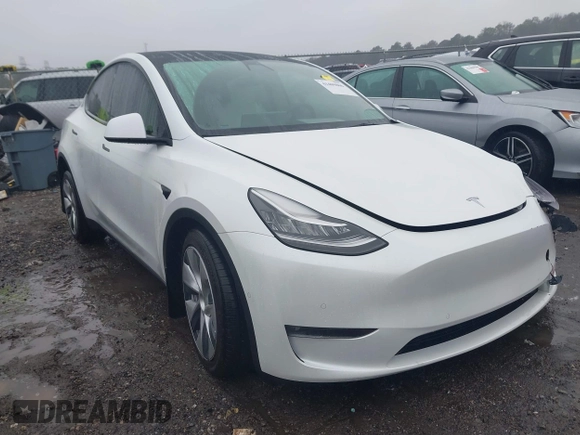 2021 Tesla Model Y Long Range with VIN 5YJYGDEEXMF228914, listed as a IAAI auction lot 41409806 with 48,276 mi miles. Bid and sale history available at carsss.com. Image 1.