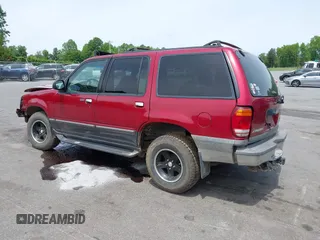 2000 Ford Explorer XLT z VIN 1FMZU73E7YZB60956, wystawiony jako IAAI lot #42218666 z przebiegiem 234 289 mil mil oraz . Historia ofert i sprzedaży dostępna na DreamBid. Obrazek 3.