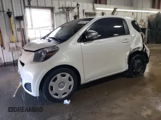 2014 Scion iQ with VIN JTNJJXB02EJ030301, listed as a Copart auction lot 51634175 with 158,157 mi miles and Salvage title. Bid and sale history available at DreamBid. Image 1.