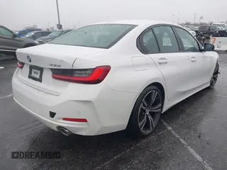 2023 BMW 3 Series 330i with VIN 3MW69FF09P8D02474, listed as a IAAI auction lot 41551264 with 20,238 mi miles. Bid and sale history available at carsss.com. Image 4.