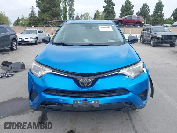 2018 Toyota RAV4 LE with VIN 2T3BFREV6JW740214, listed as a IAAI auction lot 42106349 with 105,831 mi miles and . Bid and sale history available at carsss.com. Image 13.