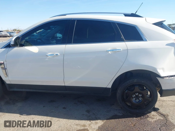 2012 Cadillac SRX Luxury Collection z VIN 3GYFNAE32CS518428, wystawiony jako IAAI lot #42153391 z przebiegiem 159 836 mil mil oraz . Historia ofert i sprzedaży dostępna na DreamBid. Obrazek 15.