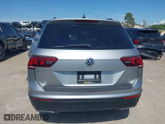 2020 Volkswagen Tiguan SE with VIN 3VV3B7AX8LM077472, listed as a IAAI auction lot 41933521 with 52,028 mi miles and . Bid and sale history available at DreamBid. Image 16.