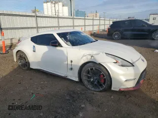 2016 Nissan 370Z z VIN JN1AZ4EH2GM935381, wystawiony jako Copart lot #83220624 z przebiegiem 56 907 mil mil oraz Szkoda całkowita • Salvage title. Historia ofert i sprzedaży dostępna na DreamBid. Obrazek 4.