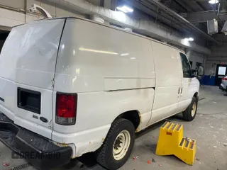 2010 Ford Econoline Cargo Commercial with VIN 1FTNE1EW4ADA91052, listed as a IAAI auction lot 42607935 with 163,519 mi miles and . Bid and sale history available at DreamBid. Image 37.
