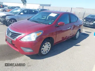 2016 Nissan Versa S with VIN 3N1CN7AP6GL901795, listed as a IAAI auction lot 42019769 with 121,561 mi miles. Bid and sale history available at carsss.com. Image 2.