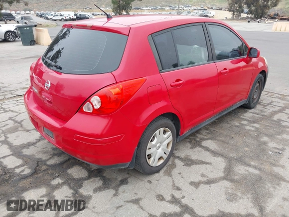 2012 Nissan Versa S with VIN 3N1BC1CP2CL369757, listed as a IAAI auction lot 41948982 with 219,466 mi miles. Bid and sale history available at carsss.com. Image 4.