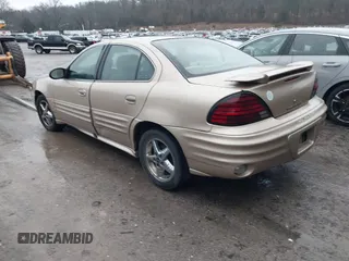 2002 Pontiac Grand Am SE1 with VIN 1G2NF52F82C269968, listed as a IAAI auction lot 41541497 with 212,736 mi miles. Bid and sale history available at carsss.com. Image 3.