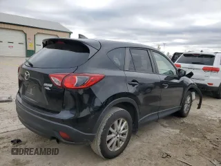 2016 Mazda CX-5 Touring z VIN JM3KE2CY0G0846699, wystawiony jako Copart lot #81785864 z przebiegiem 140 750 mil mil oraz Szkoda całkowita • Salvage title. Historia ofert i sprzedaży dostępna na DreamBid. Obrazek 3.