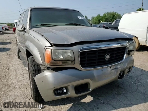 2000 Cadillac Escalade z VIN 1GYEK63R2YR210601, wystawiony jako Copart lot #64108944 z przebiegiem 186 964 mil mil oraz Szkoda całkowita • Salvage title. Historia ofert i sprzedaży dostępna na DreamBid. Obrazek 12.