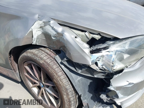 2011 BMW 1 Series 128i с VIN WBAUN1C56BVH82939, выставлен на аукционе IAAI как лот 41700305 с пробегом 91 792 миль миль и . История ставок и продаж доступна на DreamBid. Изображение 13.